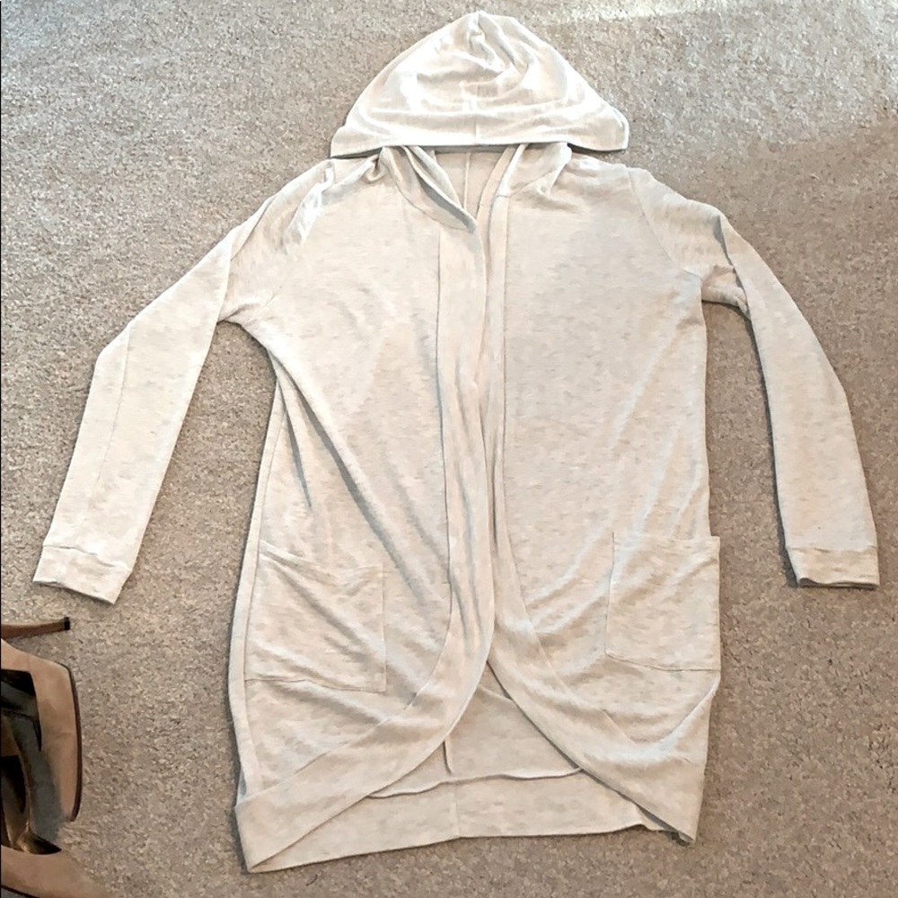 Hooded long open front sweater.